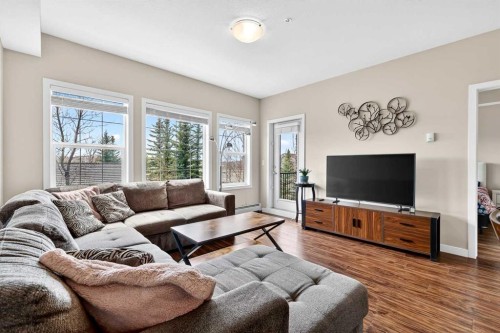 211-200 Cranfield Common Se, Calgary, AB - Indoor Photo Showing Living Room