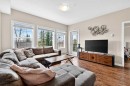 211-200 Cranfield Common Se, Calgary, AB  - Indoor Photo Showing Living Room 