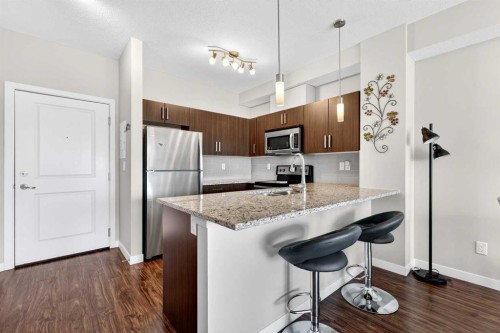 211-200 Cranfield Common Se, Calgary, AB - Indoor Photo Showing Kitchen With Stainless Steel Kitchen With Upgraded Kitchen