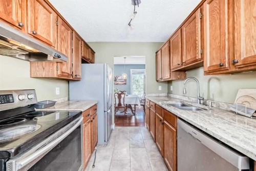 216 Hawkwood Boulevard Nw, Calgary, AB - Indoor Photo Showing Kitchen With Double Sink
