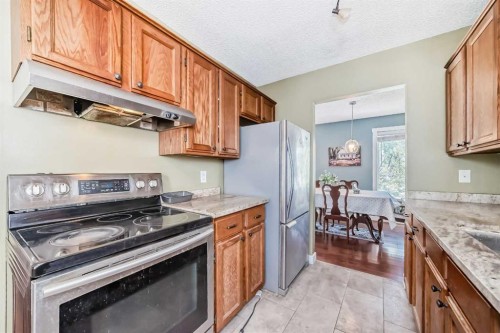 216 Hawkwood Boulevard Nw, Calgary, AB - Indoor Photo Showing Kitchen