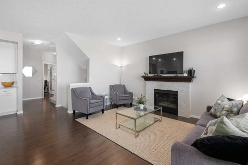 49 Tuscany Ridge Circle Nw, Calgary, AB - Indoor Photo Showing Living Room With Fireplace