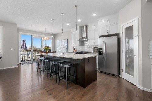 49 Tuscany Ridge Circle Nw, Calgary, AB - Indoor Photo Showing Kitchen With Stainless Steel Kitchen With Upgraded Kitchen