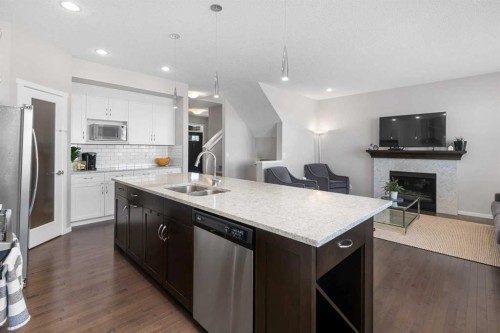 49 Tuscany Ridge Circle Nw, Calgary, AB - Indoor Photo Showing Kitchen With Stainless Steel Kitchen With Double Sink With Upgraded Kitchen
