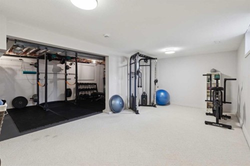 4412 Amiens Road Sw, Calgary, AB - Indoor Photo Showing Gym Room