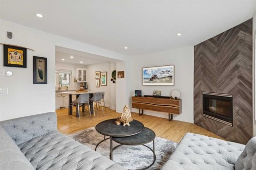 4412 Amiens Road Sw, Calgary, AB - Indoor Photo Showing Living Room With Fireplace