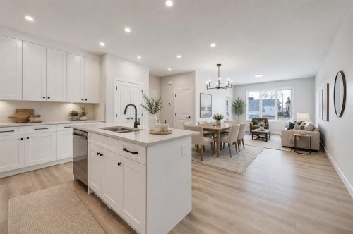 117 5 Avenue Se, High River, AB - Indoor Photo Showing Kitchen With Double Sink With Upgraded Kitchen