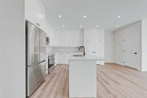 117 5 Avenue Se, High River, AB - Indoor Photo Showing Kitchen With Upgraded Kitchen