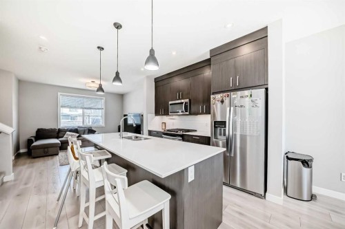 120 Chelsea Drive, Chestermere, AB - Indoor Photo Showing Kitchen With Stainless Steel Kitchen With Double Sink With Upgraded Kitchen
