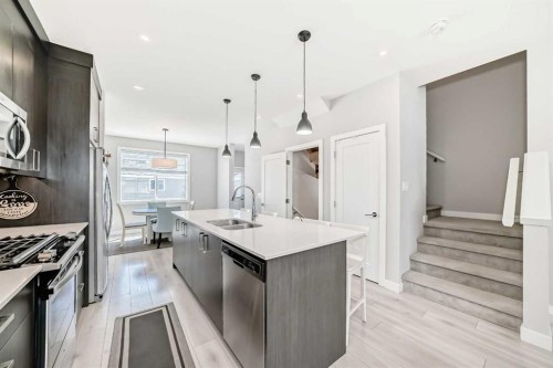 120 Chelsea Drive, Chestermere, AB - Indoor Photo Showing Kitchen With Stainless Steel Kitchen With Double Sink With Upgraded Kitchen
