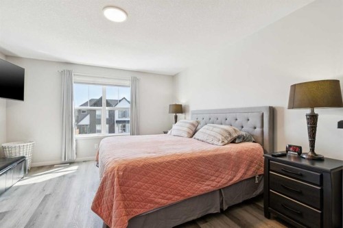 93 Wolf Gate, Okotoks, AB - Indoor Photo Showing Bedroom