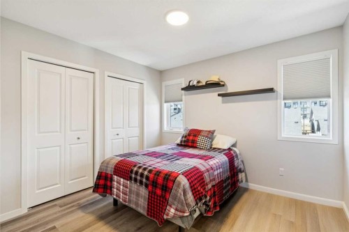 93 Wolf Gate, Okotoks, AB - Indoor Photo Showing Bedroom
