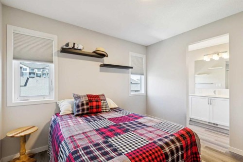 93 Wolf Gate, Okotoks, AB - Indoor Photo Showing Bedroom
