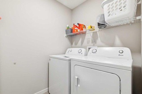 93 Wolf Gate, Okotoks, AB - Indoor Photo Showing Laundry Room