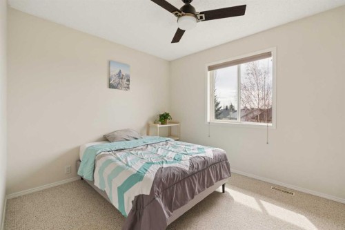 68 Cranfield Place Se, Calgary, AB - Indoor Photo Showing Bedroom