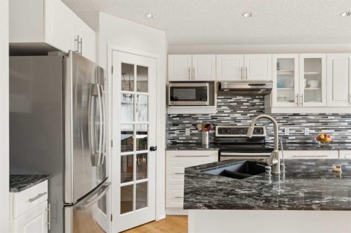 68 Cranfield Place Se, Calgary, AB - Indoor Photo Showing Kitchen With Stainless Steel Kitchen With Double Sink With Upgraded Kitchen