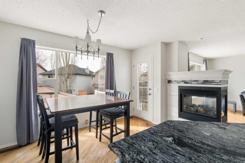 68 Cranfield Place Se, Calgary, AB - Indoor With Fireplace