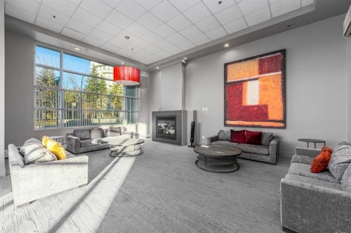 1004-1121 6 Avenue Sw, Calgary, AB - Indoor With Fireplace