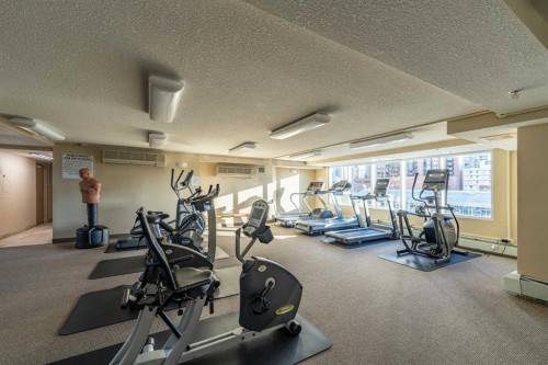 1004-1121 6 Avenue Sw, Calgary, AB - Indoor Photo Showing Gym Room
