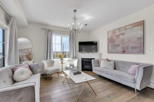 3211-99 Copperstone Park Se, Calgary, AB - Indoor Photo Showing Living Room With Fireplace