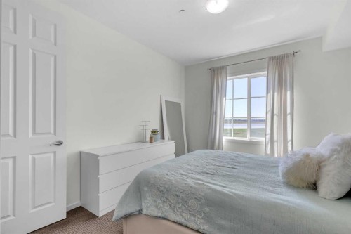 3211-99 Copperstone Park Se, Calgary, AB - Indoor Photo Showing Bedroom