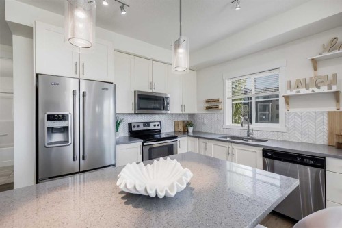 3211-99 Copperstone Park Se, Calgary, AB - Indoor Photo Showing Kitchen With Stainless Steel Kitchen With Double Sink With Upgraded Kitchen