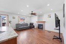 139 Saddlehorn Close Ne, Calgary, AB  - Indoor Photo Showing Living Room With Fireplace 