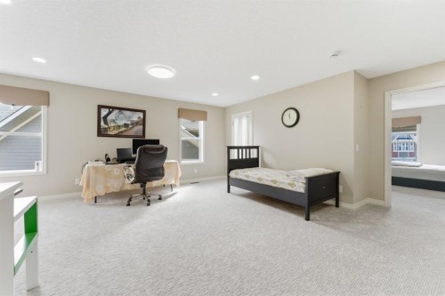 99 Marquis Cove Se, Calgary, AB - Indoor Photo Showing Bedroom