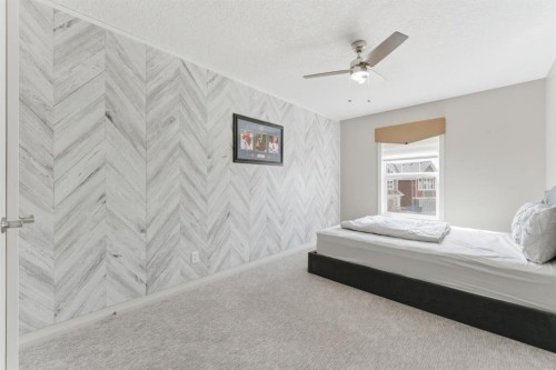99 Marquis Cove Se, Calgary, AB - Indoor Photo Showing Bedroom