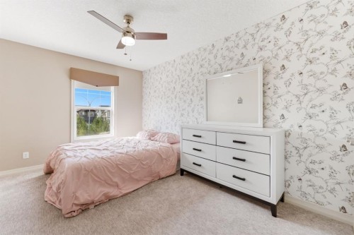 99 Marquis Cove Se, Calgary, AB - Indoor Photo Showing Bedroom