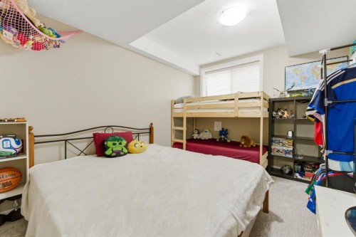99 Marquis Cove Se, Calgary, AB - Indoor Photo Showing Bedroom