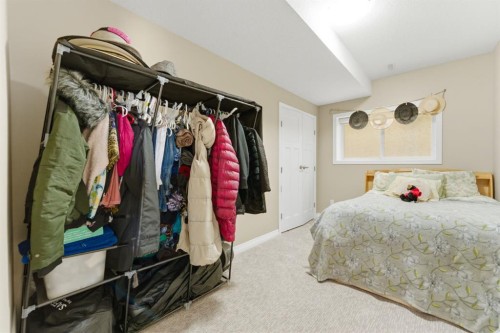 99 Marquis Cove Se, Calgary, AB - Indoor Photo Showing Bedroom