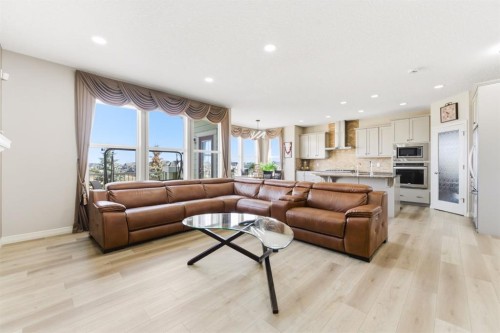 99 Marquis Cove Se, Calgary, AB - Indoor Photo Showing Living Room