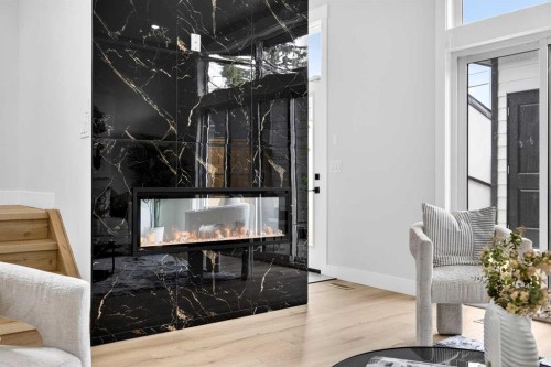 107 Hartford Road Nw, Calgary, AB - Indoor With Fireplace