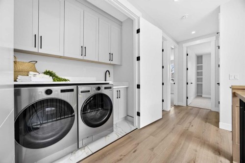 107 Hartford Road Nw, Calgary, AB - Indoor Photo Showing Laundry Room