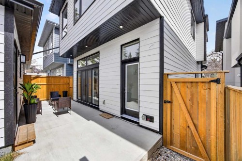 107 Hartford Road Nw, Calgary, AB - Outdoor With Deck Patio Veranda With Exterior