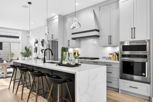107 Hartford Road Nw, Calgary, AB - Indoor Photo Showing Kitchen With Stainless Steel Kitchen With Upgraded Kitchen