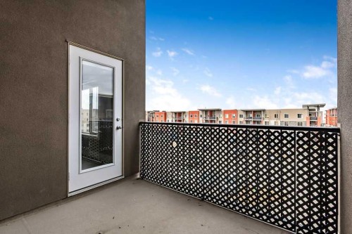 9410-403 Mackenzie Way Sw, Airdrie, AB - Outdoor With Exterior