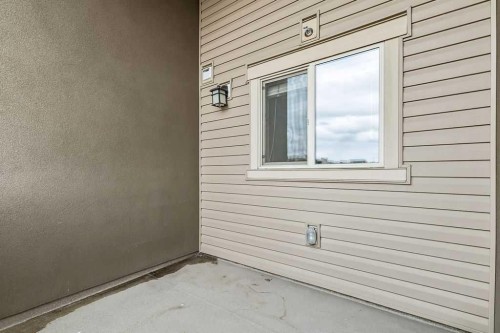 9410-403 Mackenzie Way Sw, Airdrie, AB - Outdoor With Exterior