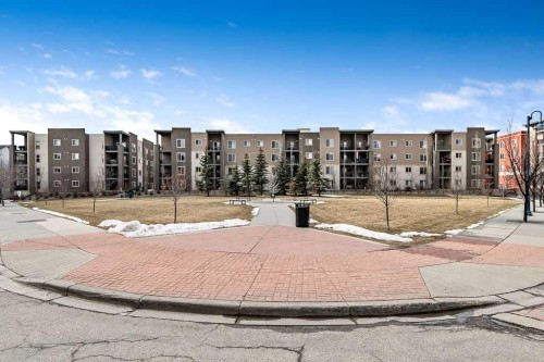 9410-403 Mackenzie Way Sw, Airdrie, AB - Outdoor With Facade