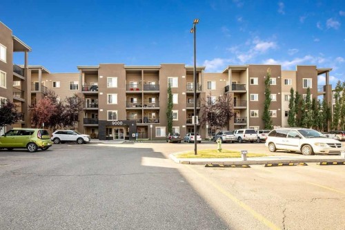 9410-403 Mackenzie Way Sw, Airdrie, AB - Outdoor With Facade