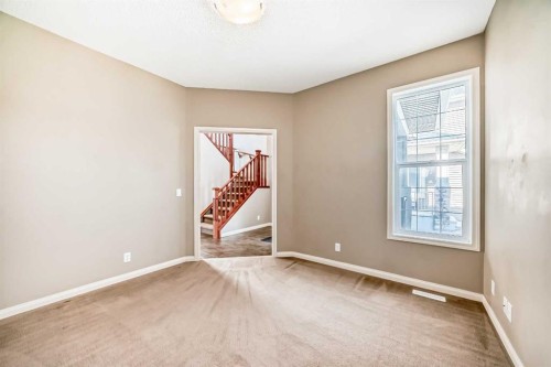 60 Sunset Circle, Cochrane, AB - Indoor Photo Showing Other Room