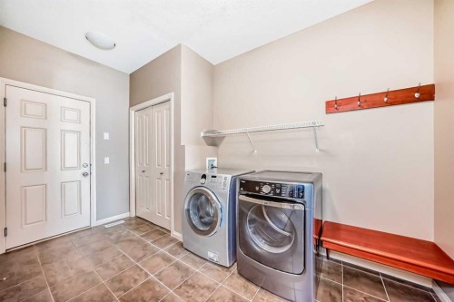 60 Sunset Circle, Cochrane, AB - Indoor Photo Showing Laundry Room