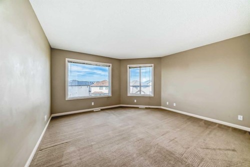 60 Sunset Circle, Cochrane, AB - Indoor Photo Showing Other Room