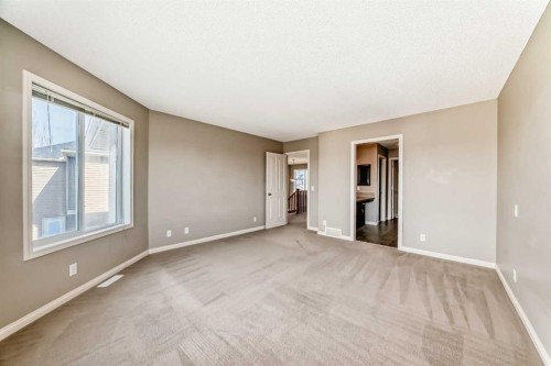 60 Sunset Circle, Cochrane, AB - Indoor Photo Showing Other Room