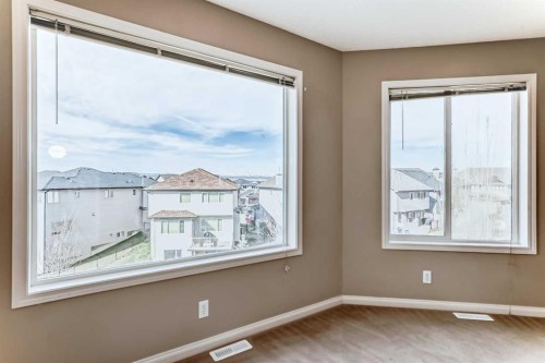 60 Sunset Circle, Cochrane, AB - Indoor Photo Showing Other Room