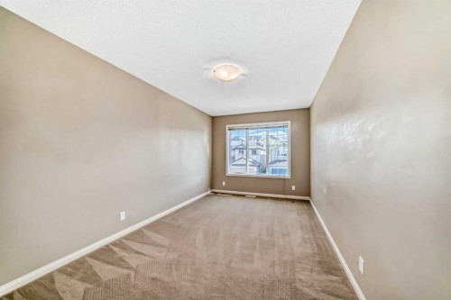 60 Sunset Circle, Cochrane, AB - Indoor Photo Showing Other Room