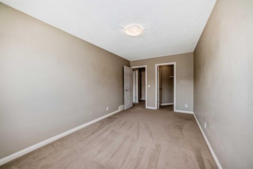 60 Sunset Circle, Cochrane, AB - Indoor Photo Showing Other Room