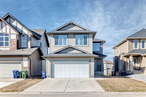 60 Sunset Circle, Cochrane, AB - Outdoor With Facade