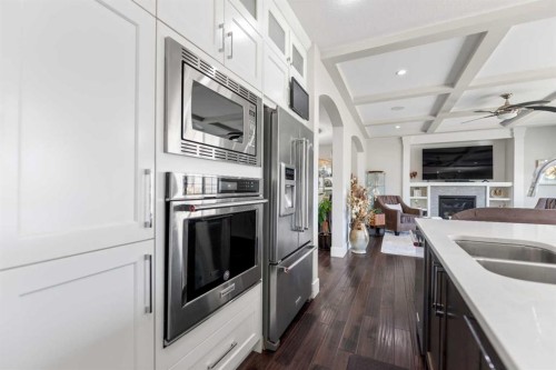 125 Kinniburgh Loop, Chestermere, AB - Indoor Photo Showing Kitchen With Stainless Steel Kitchen With Double Sink With Upgraded Kitchen